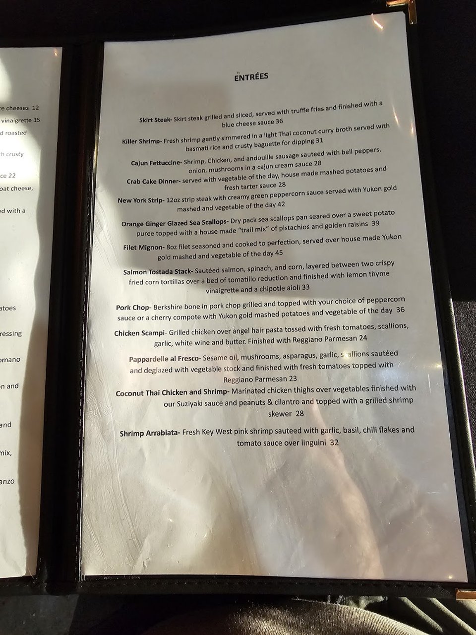 Restaurant menu showing varied main dishes.